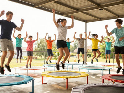 People of all ages enjoying trampoline fitness.