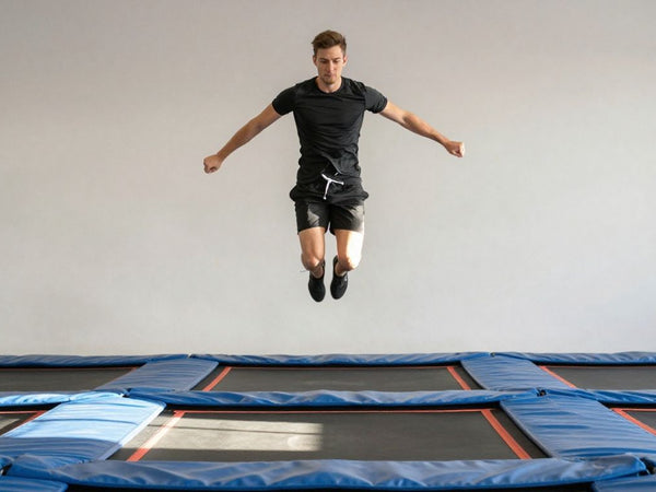 Person jumping on a rebounder for weight loss.
