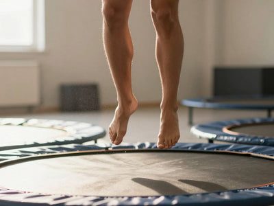 Person rebounding on a mini-trampoline, mid-air.