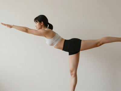 Woman doing wall Pilates workout