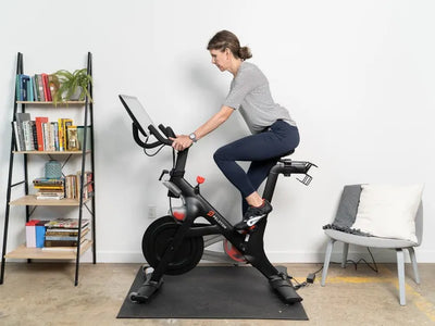 person on stationary bike