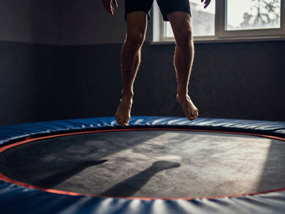Person jumping on a trampoline for lymphatic drainage.