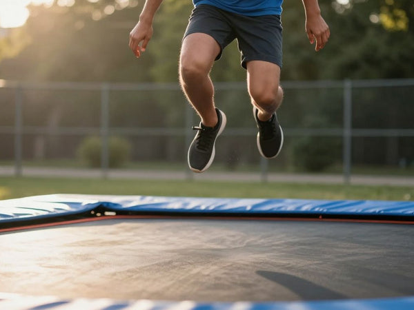 Person jumping on a trampoline for a fun workout.