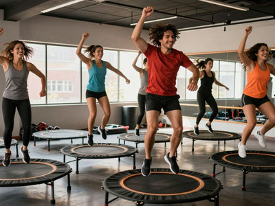 People jumping on rebounders in a fitness class.