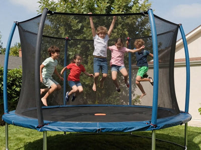 14ft trampoline in a backyard with kids jumping.