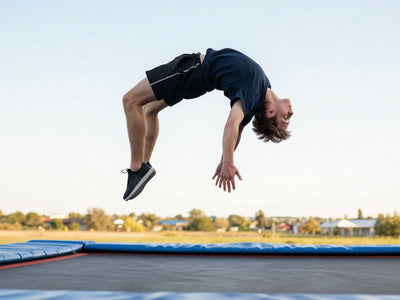 Beginner performing a trampoline backflip