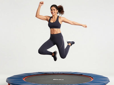 Shilpa Shetty jumping on a trampoline during a workout.