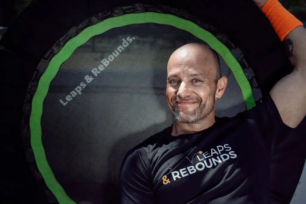 Marc posing with a Leaps & Rebounds rebounder